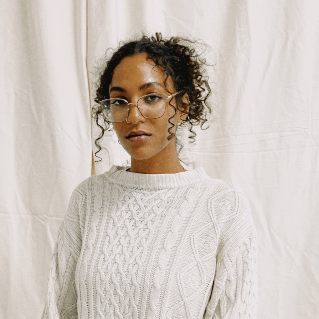 Portrait of Kynd hair braider Awa of @hairbyawa_ from Berlin