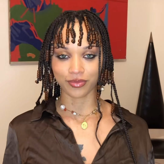 Portrait of Kynd hair braider Kim of @katana_me_styles from Berlin